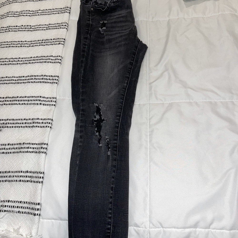 Black skinny ripped jeans. Size 0